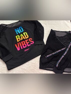 Zumba Fitness "No Bad Vibes" Black Mesh Sleeve Top - Rainbow Print